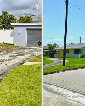 Two concrete driveways leading to a gray garage in Wilson, NC