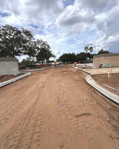 Concrete curb forms on a graded sand base for a parking area in Wilson, NC