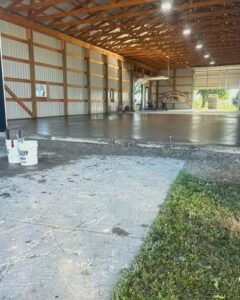 Smooth gray concrete floor inside a pole barn in Wilson, NC